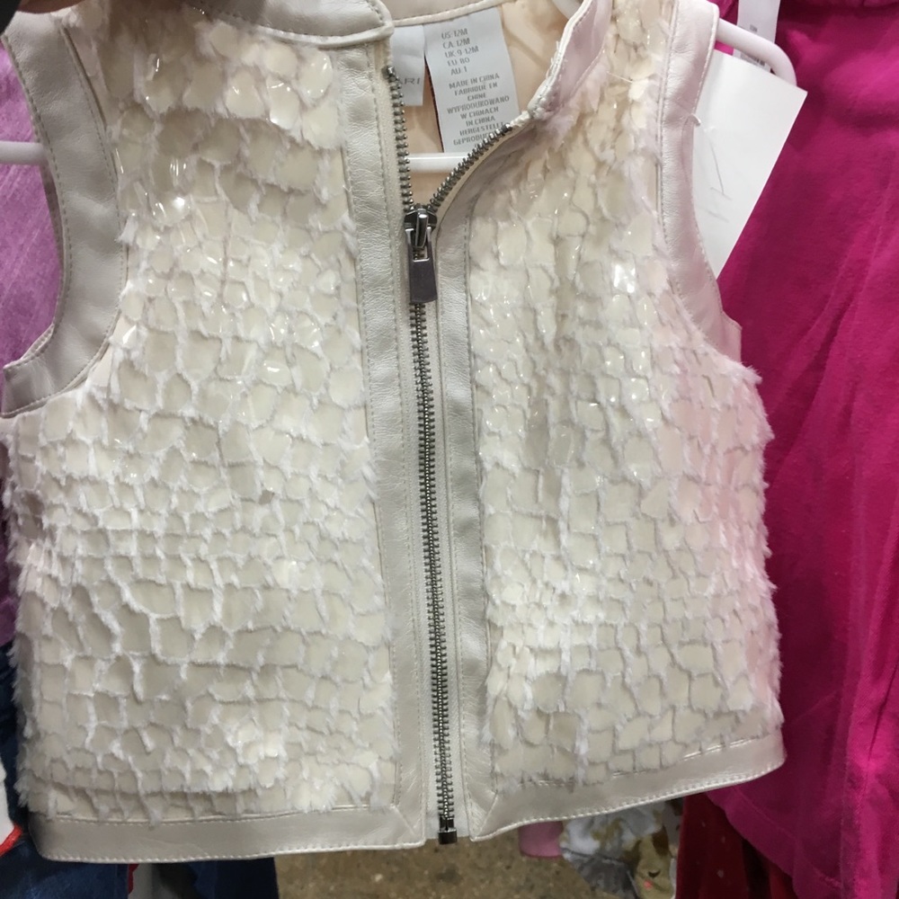 Tahari cream fur vest.